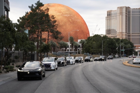 建筑旁的路上有许多车

AI 生成的内容可能不正确。